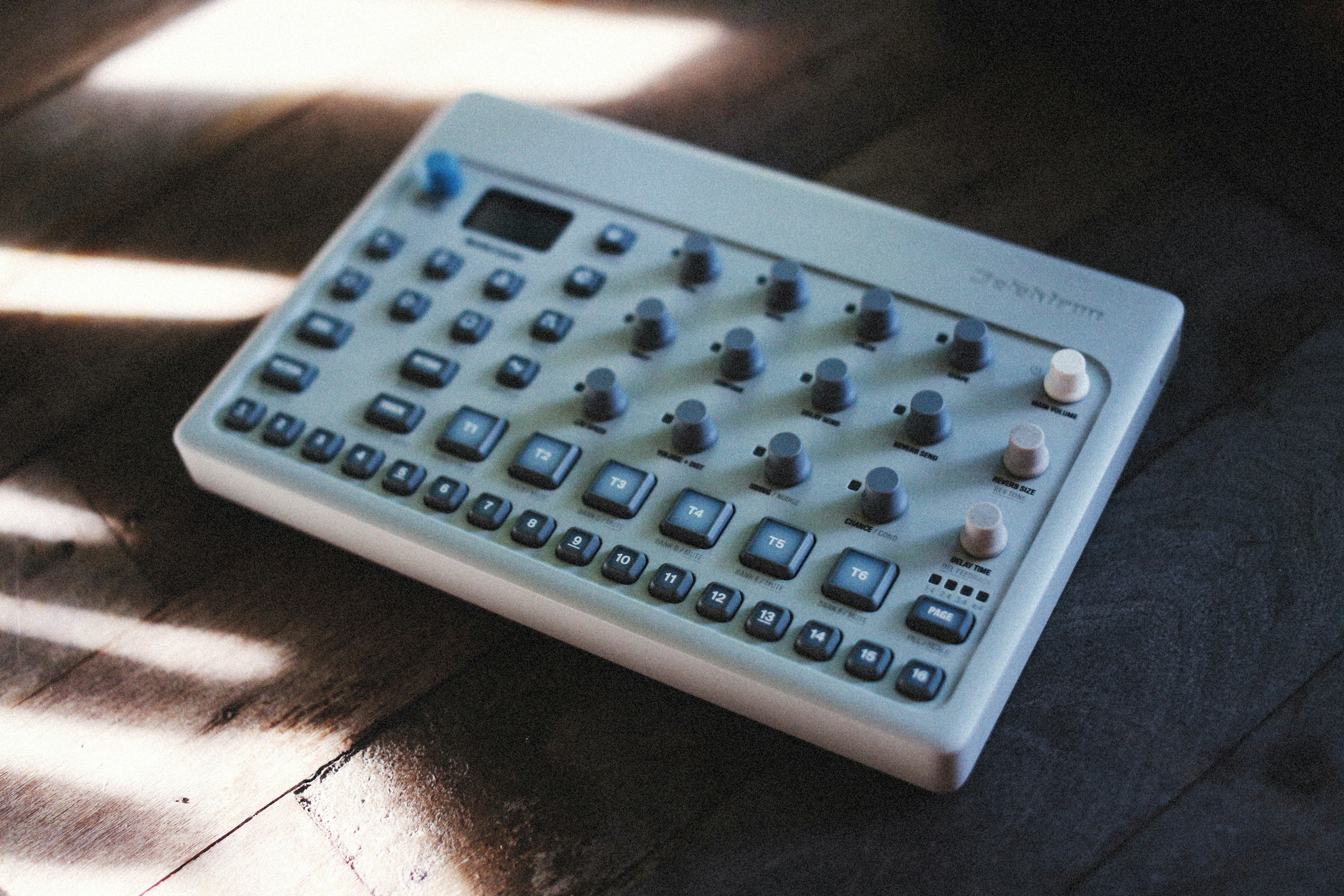 a calculator sitting on top of a wooden table